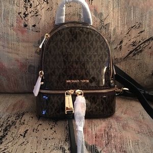 michael kors glossy backpack